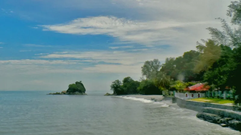 Batu Ferringhi beach on a clear day, Penang Island